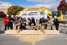 Group of elected officials, project stakeholders and Maryland Stadium Authority leadership at ceremonial groundbreaking of Hagerstown multi-use sports and events facility